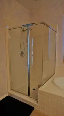 a shower with a glass door in a bathroom at Modern Luxury Living, relax and enjoy your stay! in Rancho Cordova