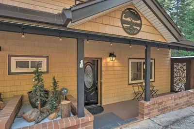 a front porch of a house with a front door at Near Hiking Trails Cabin with Deck in Pioneer! in Pioneer