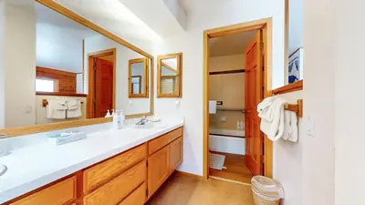 a bathroom with a sink and a mirror at Snowcreek III #448 condo in Mammoth Lakes