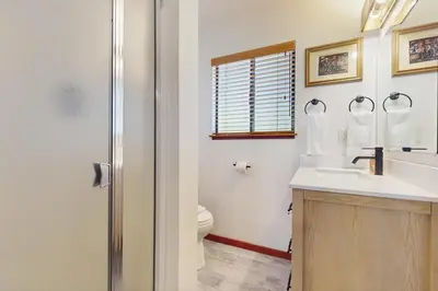 a bathroom with a sink and a toilet at Indian Hill Hush in Truckee