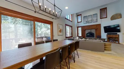a large dining room with a large table and chairs at Timbers #6 townhouse in Mammoth Lakes