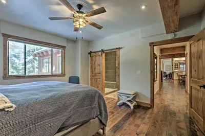 a bedroom with a bed and a ceiling fan at 4 Mi to Diamond Peak Ski Resort Gem with Hot Tub in Incline Village