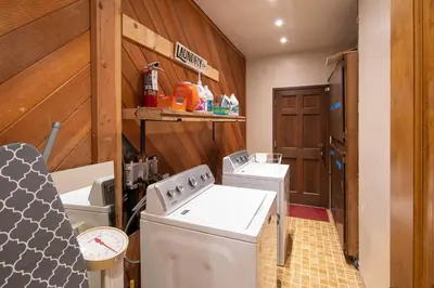 a kitchen with a washer and dryer in a house at 4 Mi to Diamond Peak Ski Resort Gem with Hot Tub in Incline Village