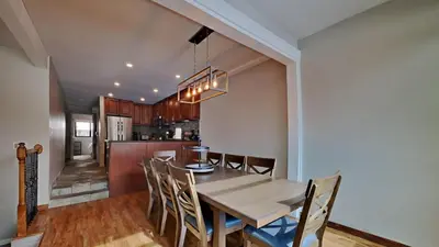 a kitchen and dining room with a table and chairs at 1849 Condos 511 condo in Mammoth Lakes