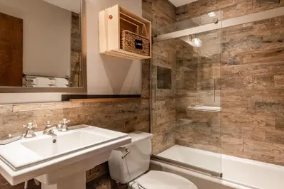 a bathroom with a sink and a toilet and a shower at Helios 11N in Mammoth Lakes