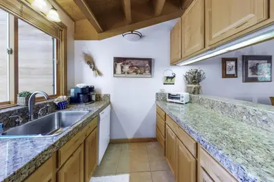 a kitchen with a sink and a counter top at Northstar Gold Bend Retreat in Truckee