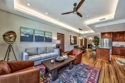 a living room with a couch and a table at Luxury Three Bedroom Residence steps from Heavenly Village condo in South Lake Tahoe
