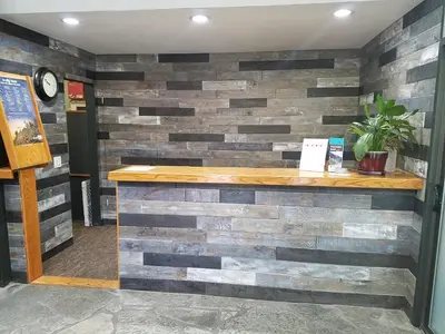 a wall made out of reclaimed wood at Mammoth Ski Racquet Club 55 in Mammoth Lakes