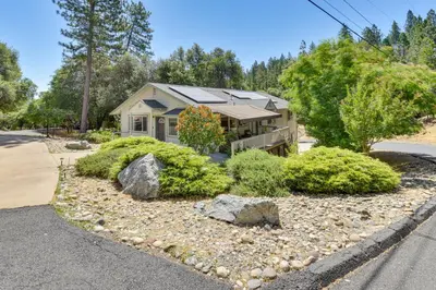 a house with a garden in front of it at Gateway to Yosemite Group-Friendly Groveland Home in Groveland