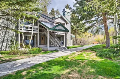 a house with a porch and a driveway at Hot Tub Access Mammoth Lakes Nature Escape! in Mammoth Lakes
