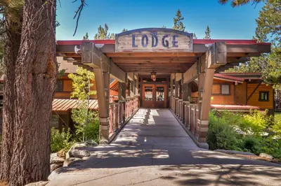 a building with a sign that reads lodge at Hammock Holidays in Truckee