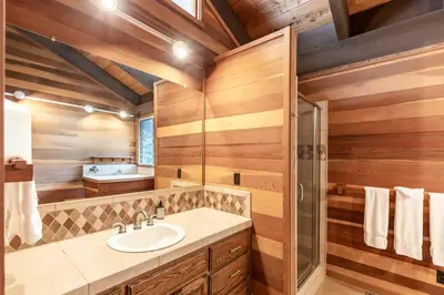 a bathroom with a sink and a shower at Beautiful 4-Bedroom Contemporary Mountain Home condo in Truckee