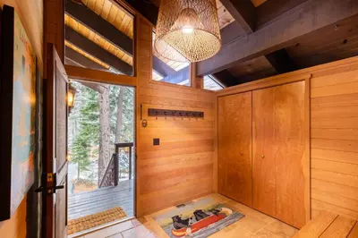 a sauna with wood paneling and a large window at Beautiful 4-Bedroom Contemporary Mountain Home condo in Truckee