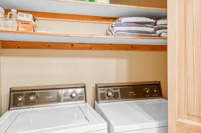 two washer and dryer in a small closet at Blue Antler in Truckee