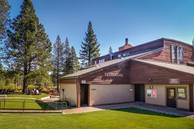 a building with a garage in a yard at Blue Antler in Truckee