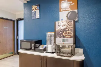 a coffee machine sitting on top of a counter at Motel 6-Auburn, CA in Auburn