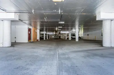 an empty parking lot in a parking garage at Crestview #25 condo in Mammoth Lakes