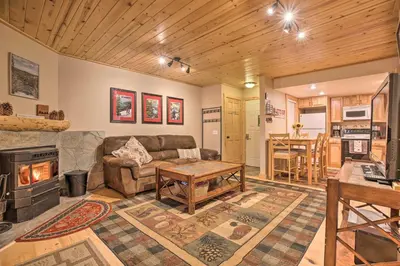 a living room with a couch and a fireplace at Cozy Family Condo in Mammoth Lakes with Balcony in Mammoth Lakes