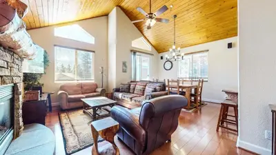 a living room with a couch and a table at Mammoth Gateway Village #7 condo in Mammoth Lakes