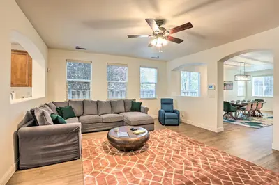 a living room with a couch and a table at 12 Mi to Riverwalk District Quiet Reno Retreat in Reno