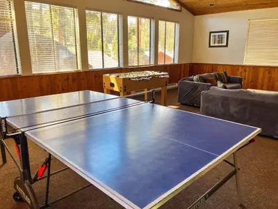 a large ping pong table in a living room at Condos 1849 #102 in Mammoth Lakes