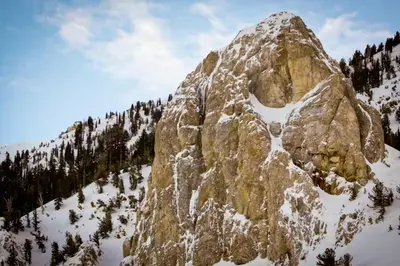 a large rocky mountain with snow on it at Mammoth View Villas 24 in Mammoth Lakes