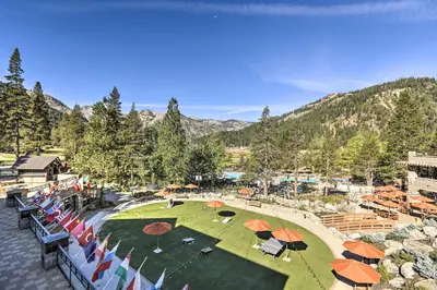 an aerial view of a golf course with umbrellas at 6 Mi to Lake Tahoe Everline Resort Retreat! in Olympic Valley