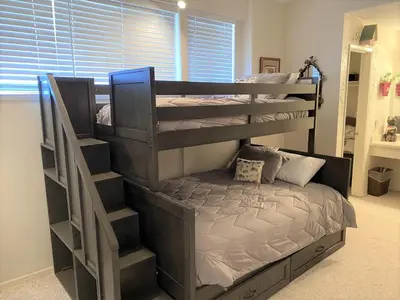 a bedroom with a bunk bed and a bunk bedouble at St Anton Courtyard View 2-Bedroom Condos with two oversized jacuzzi spas in Mammoth Lakes