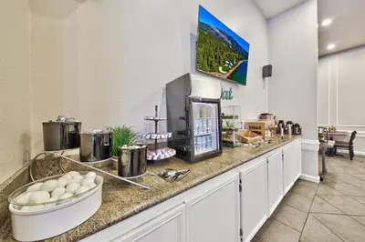 a kitchen with a counter with a breakfast buffet at Forest Suites Resort at the Heavenly Village in South Lake Tahoe