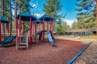 a playground with a slide in a park at Inntopia in Zephyr Cove