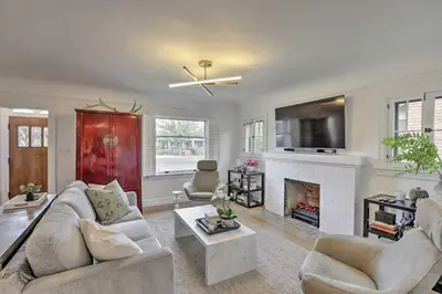 a living room with a couch and a fireplace at Reno Home Less Than 1 Mile to Midtown and Truckee River in Reno