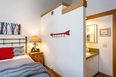 a bedroom with a bed with a shark decal on the wall at Northstar - Gold Bend Getaway in Truckee