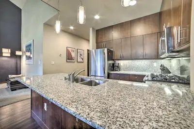 a kitchen with a sink and a counter top at Modern Mammoth Lakes Condo Ski, Hike, and More! in Mammoth Lakes