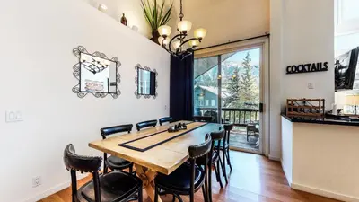 a dining room with a table and chairs at Snowcreek #840 condo in Mammoth Lakes
