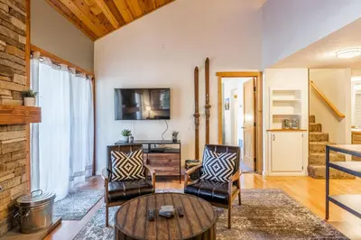 a living room with two chairs and a table at New Listing Updated 1 Bed and Loft 2 Full Bath La Residence IV N7 Sleeps 4 and Steps to Free Shuttle in Mammoth Lakes