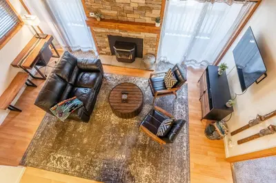 an overhead view of a living room with a couch and a fireplace at New Listing Updated 1 Bed and Loft 2 Full Bath La Residence IV N7 Sleeps 4 and Steps to Free Shuttle in Mammoth Lakes