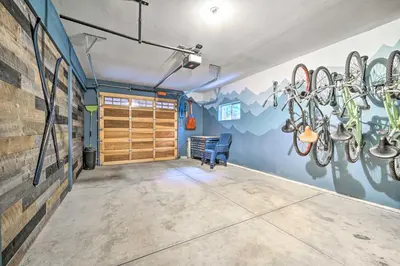 a room with a bunch of bikes on the wall at Bikes, Grill and Views Luxe Truckee Cabin! in Truckee