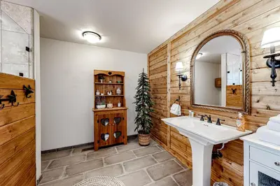 a bathroom with a sink and a mirror at Ski Run Villas 8 in Mammoth Lakes