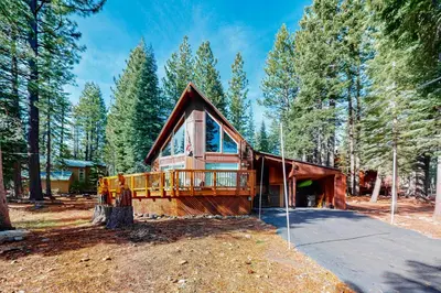 a house in the middle of a forest at Truckee Secret in Truckee