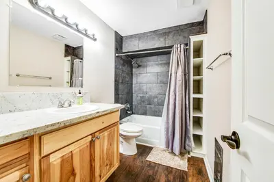 a bathroom with a sink and a toilet at Wildflower Landing in Groveland