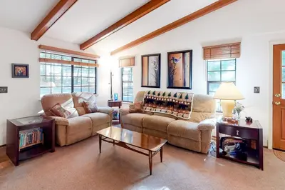 a living room with two couches and a coffee table at Hikers Haven in Arnold