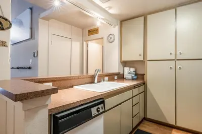 a kitchen with a sink and a counter top at New Listing 2 bedroom and Loft 2 bath Summit E Bldg 16 condo sleeps 8 Steps to Eagle Lodge Chair 15 in Mammoth Lakes