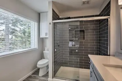a bathroom with a toilet and a glass shower at Less Than 1 Mi to Slopes! Heavenly Daze Chalet in Tahoe in Stateline