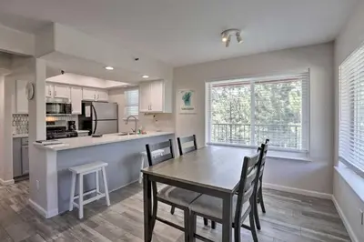 a kitchen and dining room with a table and chairs at Less Than 1 Mi to Slopes! Heavenly Daze Chalet in Tahoe in Stateline