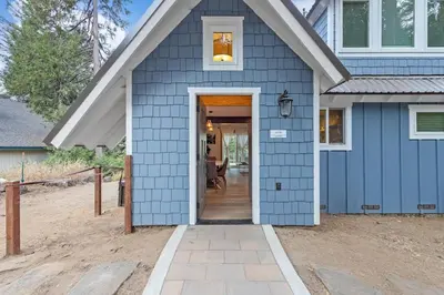 a blue house with a blue siding at Starfall in Yosemite West
