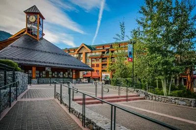 a building with a clock tower in front of a building at Susquehana Luxury in South Lake Tahoe