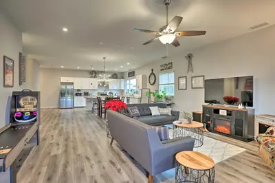 a living room with a couch and a table at Stunning Clovis Home about 1 Mile to Old Town! in Clovis