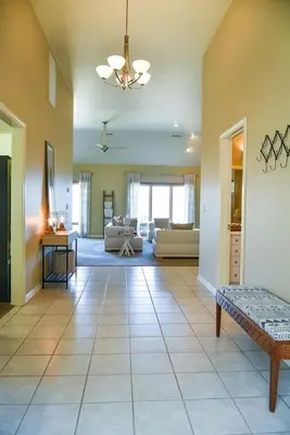 a large living room with a couch and a table at Sierra Ranch - A Yosemite Retreat in Mariposa
