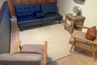 a living room with a blue couch and chairs at Kingswood Village 2 in Kings Beach