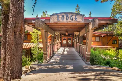 a building with a sign that reads lodge at Snow Porch in Truckee